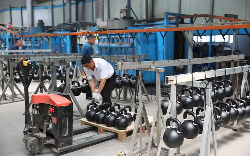 Kettlebell sand mold and casting press at ShuangJia factory