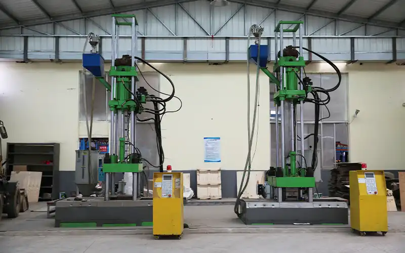 Vertical hydraulic molding press at ShuangJia Fitness factory in Dingzhou